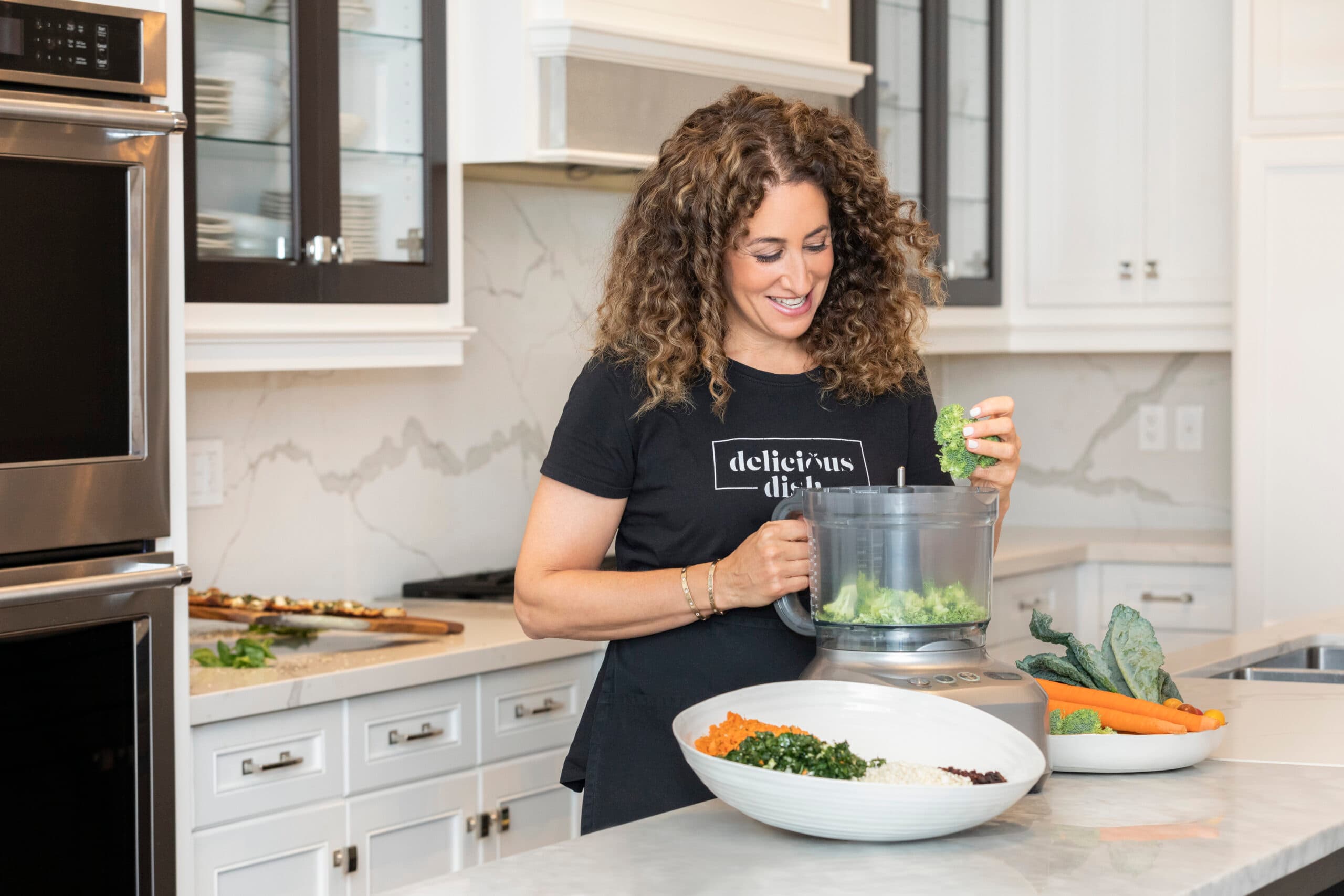 Carolyn cooking in her kitchen