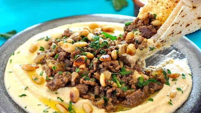 Grilled Butterflied Leg of Lamb with Herb Marinade and Spoon